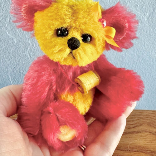 SOLD! Zia:  4 3/4”  Miniature Yellow & Coral Artist Panda Bear